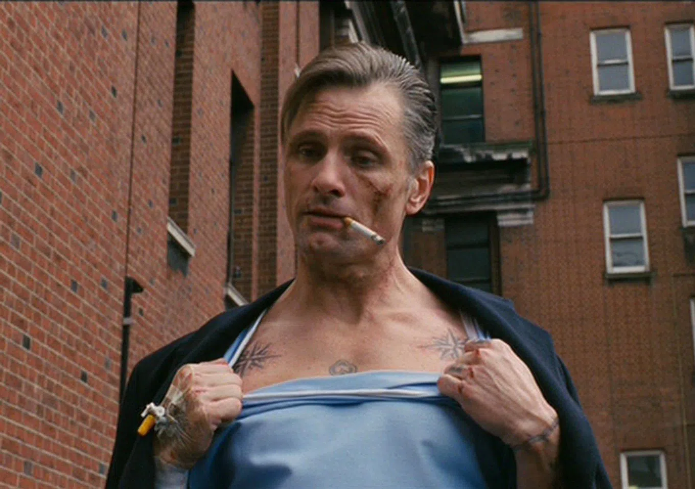 A meme image with a man smoking cigarette