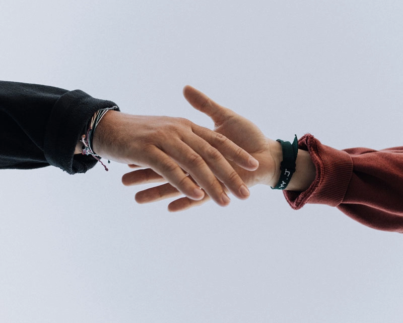 Two hands about to shake